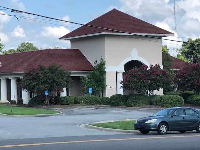 Slide of Norman Roofing