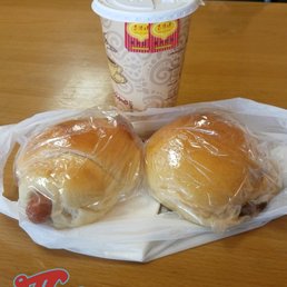 Large milk tea, hot dog bun and bbq pork bun. Large milk tea, hot dog bun and bbq pork bun.
