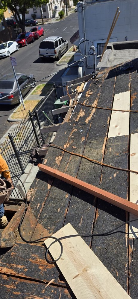 Slide of Astro Roofing