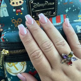 Light pink acrylic with chrome added for some shine. LOVE THEM!