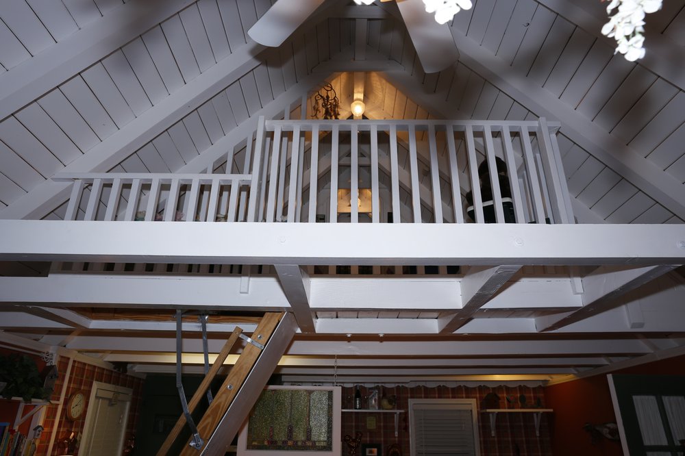 Looking up at loft which has 2 twin size beds. Yelp