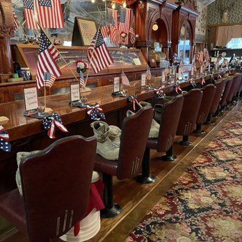 Buffalo Bill's Irma Hotel - american flags on the bar - Salad Near Me - Cody, Wyoming