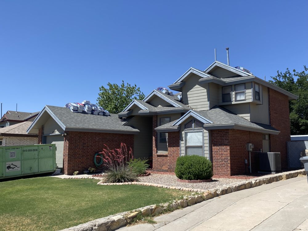 Slide of Mann & Sons Roofing