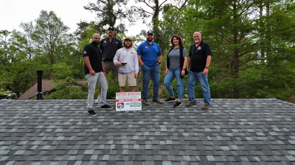 Slide of Witten Roofing