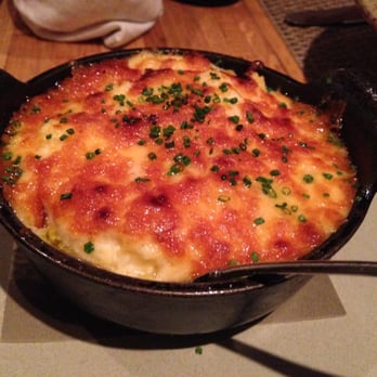 Husk - Wood Fired Geechie Boy Grits with Sweetwater Valley Cheddar - potentially one of the best things you'll ever eat. - American Near Me - Charleston, South Carolina Husk - Wood Fired Geechie Boy Grits with Sweetwater Valley Cheddar - potentially one of the best things you'll ever eat. - American Near Me - Charleston, South Carolina