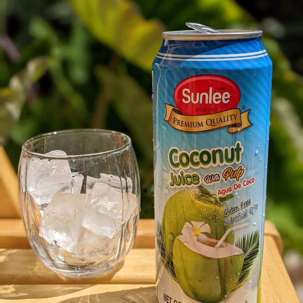 SunLee - a can of coconut juice next to a glass of water - Imported Food Near Me - Santa Fe Springs, California SunLee - a can of coconut juice next to a glass of water - Imported Food Near Me - Santa Fe Springs, California