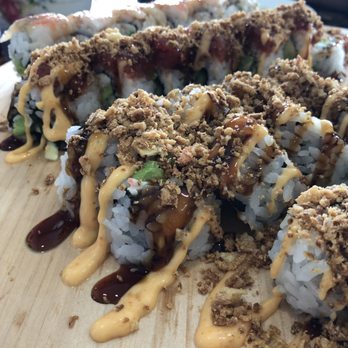 Sushi To Go & More - From the back: Tiger roll, passion roll, and two tootsie rolls - Sushi Bars Near Me - Tucson, Arizona Sushi To Go & More - From the back: Tiger roll, passion roll, and two tootsie rolls - Sushi Bars Near Me - Tucson, Arizona
