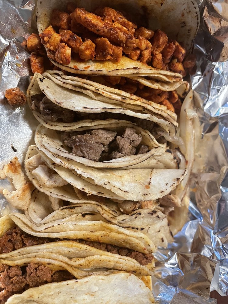 Tortilleria Y Loncheria Monarcha Logo