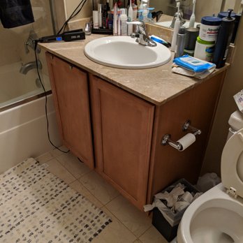 Fine Painting - Bathroom cabinet before photo - Painters Near Me - Chicago, Illinois Fine Painting - Bathroom cabinet before photo - Painters Near Me - Chicago, Illinois