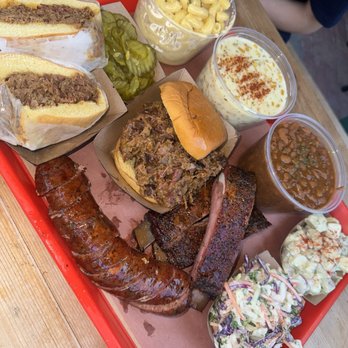 Terry Black's Barbecue - Jalapeño sausage, chopped brisket sandwich, mac & cheese, corn, beans, ribs, coleslaw, potato salad and pickles! - Barbeque Near Me - Fort Worth, Texas