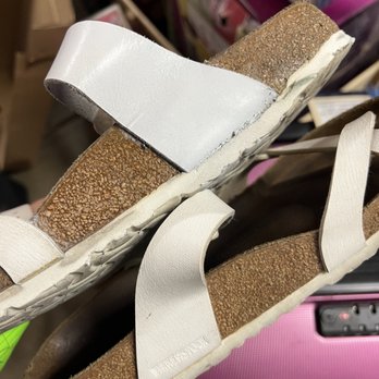 Shasta Boot Company - Bottom of the repaired shoe is buldging and glue still all over the place (this is after I asked if he could clean up the glue everywhere) - Shoe Stores Near Me - Redding, California