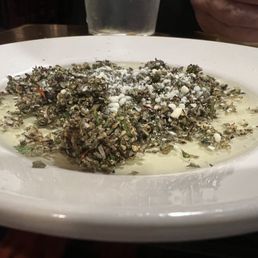 Herb and oil dip for bread. Herb and oil dip for bread.
