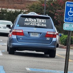 Alba Taxi - Rude taxi driver.