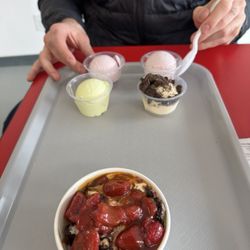 Flyboys Frozen Custard - Vanilla frozen custard with strawberries, salted caramel, and Oreos and a custard flight