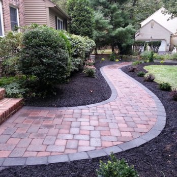 Fleur De Lis Hardscaping - a brick walkway - Landscaping Near Me - Mount Laurel, New Jersey Fleur De Lis Hardscaping - a brick walkway - Landscaping Near Me - Mount Laurel, New Jersey