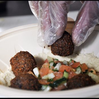 District Falafel - Falafel Hummus Bowl with chopped salad - Food Trucks Near Me District Falafel - Falafel Hummus Bowl with chopped salad - Food Trucks Near Me