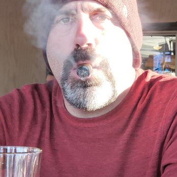 The Good Times - Enjoying a smoke at Good Times. - Bars Near Me - Eugene, Oregon