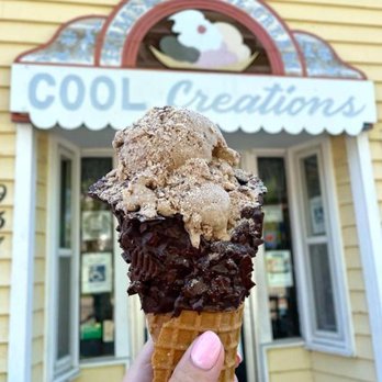 Cool Creations - a hand holding an ice cream cone - Ice Cream & Frozen Yogurt Near Me - Lockport, Illinois
