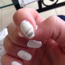 The Glam - Day 2- acrylic peeling off and falling off in chunks, natural nail broken and jagged, polish chipping and acrylic cracking.