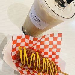 Amazing vietnamese ice coffee boba with cheese filled corn dog topped with mustard and ketchup. My favs!