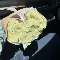 Hot grilled chicken creamy pesto style on baguette