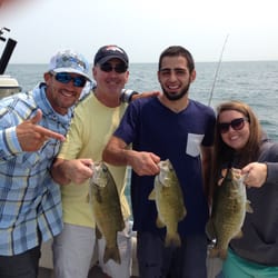 Fish HeadZ Sport Fishing Charter - Triple bass for this family outing!! We landed over 40 smallmouth bass this day!!