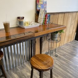 Perkolate Marketplace - Seating and take a book, read a book, leave a book area