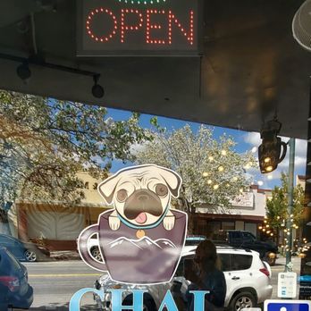 Chai Coffee Co - Window open sign with a pug dog whom I presume is the store mascot. - Coffee & Tea Near Me - Yucaipa, California Chai Coffee Co - Window open sign with a pug dog whom I presume is the store mascot. - Coffee & Tea Near Me - Yucaipa, California