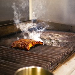 Warehouse BBQ - Smoked ribs sauced and grilled