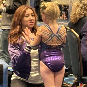 New Vibe Gymnastics - Violet pep talking my daughter after a tough vault warm-up. - Gymnastics Near Me - Santa Monica, California New Vibe Gymnastics - Violet pep talking my daughter after a tough vault warm-up. - Gymnastics Near Me - Santa Monica, California