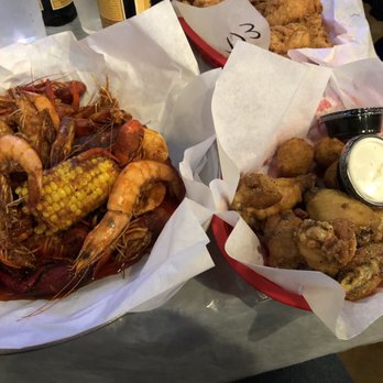 Red Claws Crab Shack - Lemon pepper wings with hush puppies and #1 - Cajun/Creole Near Me - Arlington, Texas Red Claws Crab Shack - Lemon pepper wings with hush puppies and #1 - Cajun/Creole Near Me - Arlington, Texas