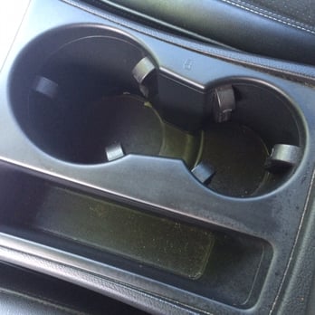 A to Z Express Car Wash - Cup holders were hardly touched but there was cleaning liquid sitting in the bottom. This was after I soaked it up. - Car Wash Near Me - Coram, New York