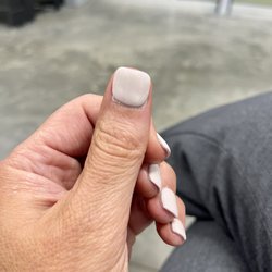 The Nail Bar - Technician did the wrong color powder(even after showing the color) then they tried to just paint over it to get it right.