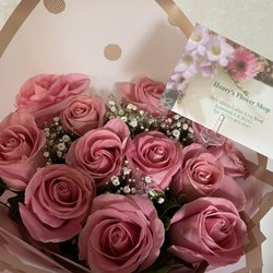 Honey's Flowers - One dozen pink roses ordered & delivered quickly through DoorDash! There's some glitter on the petals and they smell amazing.