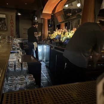 Lone Wolf - a man and a woman at a bar - Bars Near Me - Chicago, Illinois
