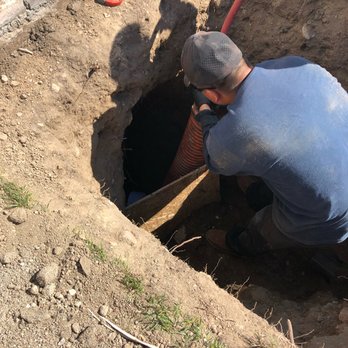 Shellback Plumbing and Drain - Crew working hard inserting sewer fiberglass lining system - Plumbing Near Me - Valencia, California Shellback Plumbing and Drain - Crew working hard inserting sewer fiberglass lining system - Plumbing Near Me - Valencia, California