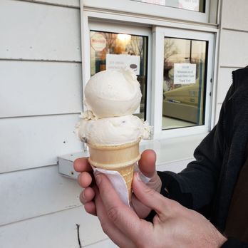 Katie's Korner - a person holding a cone of ice cream - Ice Cream & Frozen Yogurt Near Me - Girard, Ohio