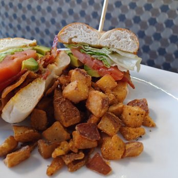 Tavern & Tap - a sandwich with bacon, lettuce, tomato, and lettuce - New American Near Me - Lansing, Michigan Tavern & Tap - a sandwich with bacon, lettuce, tomato, and lettuce - New American Near Me - Lansing, Michigan