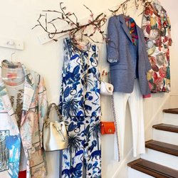The Dandelion - Complete looks and knockout standalone pieces line the stairs to the second floor