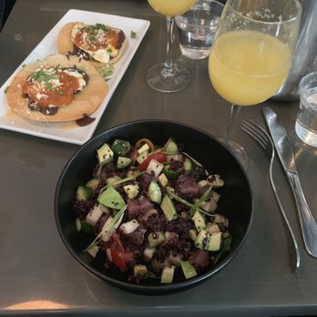 Prank - Ahi poke bowl, $25 mimosa bucket, and Huevos Rancheros. Wet burrito in the background - Cocktail Bars Near Me - Los Angeles, California