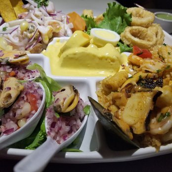 Lima Limon - The sampler, $40 but HUGE. Big enough for two people and the quality of the seafood was excellent! I was very impressed. - Peruvian Near Me - Las Vegas, Nevada Lima Limon - The sampler, $40 but HUGE. Big enough for two people and the quality of the seafood was excellent! I was very impressed. - Peruvian Near Me - Las Vegas, Nevada