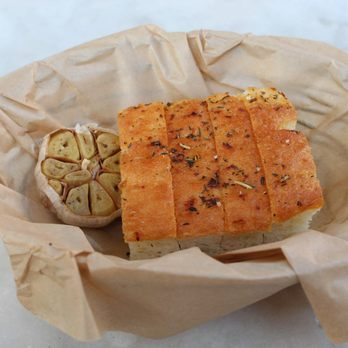 Caffe Concerto - Complimentary focaccia with roasted garlic - Pizza Near Me - Los Angeles, California Caffe Concerto - Complimentary focaccia with roasted garlic - Pizza Near Me - Los Angeles, California