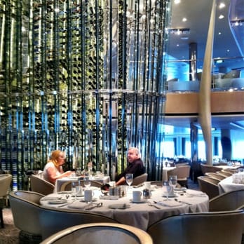 Celebrity Solstice - Two Story Wine Rack in Main Dining Room - Tours Near Me Celebrity Solstice - Two Story Wine Rack in Main Dining Room - Tours Near Me