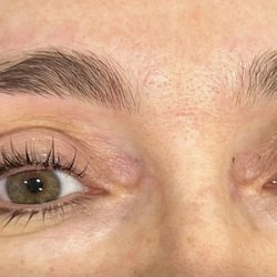 "Experience the artistry of our eyebrow threading service, where precision meets beauty."