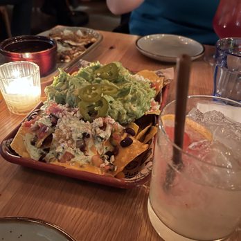 Pearl & Lime - Pearl and lime nachos with guacamole and the el pomelo (grapefruit margarita) - Latin American Near Me - Quincy, Massachusetts Pearl & Lime - Pearl and lime nachos with guacamole and the el pomelo (grapefruit margarita) - Latin American Near Me - Quincy, Massachusetts