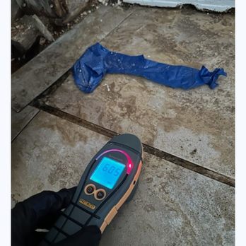DryAgain Water, Mold and Fire Restoration Services - Moisture reading under tiles - Damage Restoration Near Me - Big Bear, California DryAgain Water, Mold and Fire Restoration Services - Moisture reading under tiles - Damage Restoration Near Me - Big Bear, California