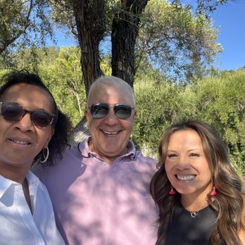 Sip n' Smile Chauffeur - hree people posing for a picture - Wine Tours Near Me Sip n' Smile Chauffeur - hree people posing for a picture - Wine Tours Near Me