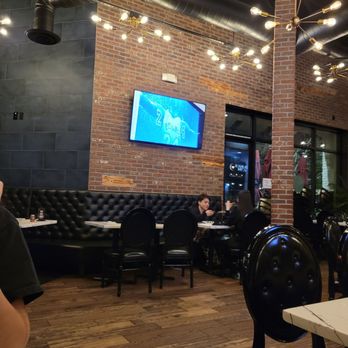 Patxi’s Pizza - The area inside is open, relaxing, clean & some tvs on playing sports - Pizza Near Me - Porter Ranch, California Patxi’s Pizza - The area inside is open, relaxing, clean & some tvs on playing sports - Pizza Near Me - Porter Ranch, California