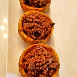 The Cuban Around The Corner - Tostones Rellenos con Picadillo (green plantain, filled with ground beef).