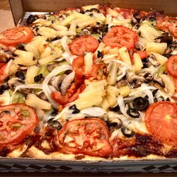 Petrilli's Pizza - Mushrooms/olives/tomatoes,/peppers/pineapple/onions. Nice & loaded. A "Small" (12")
